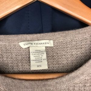 Sand color, light weight sweater with front pocket